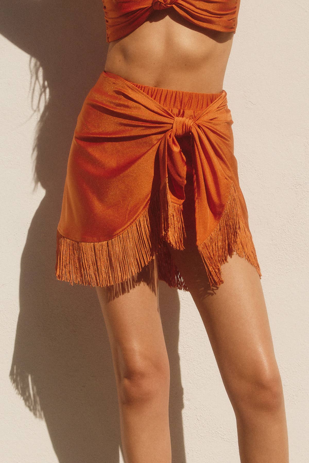 KNOT YOUR AVERAGE FRINGE MINI SKORT | MIMOSA